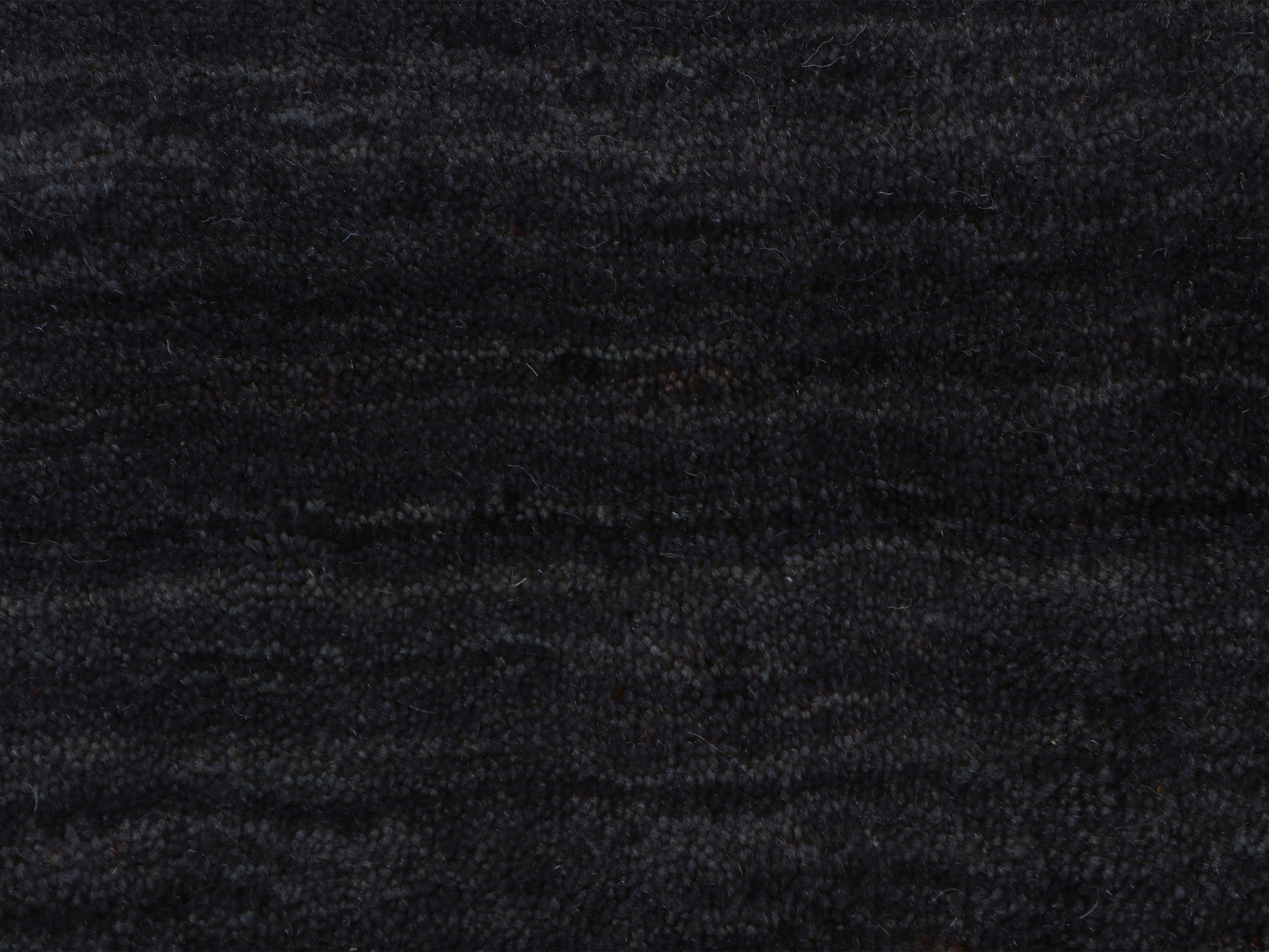Wollteppich Gabbeh Uni Rund Schwarz in schwarz aus wolle