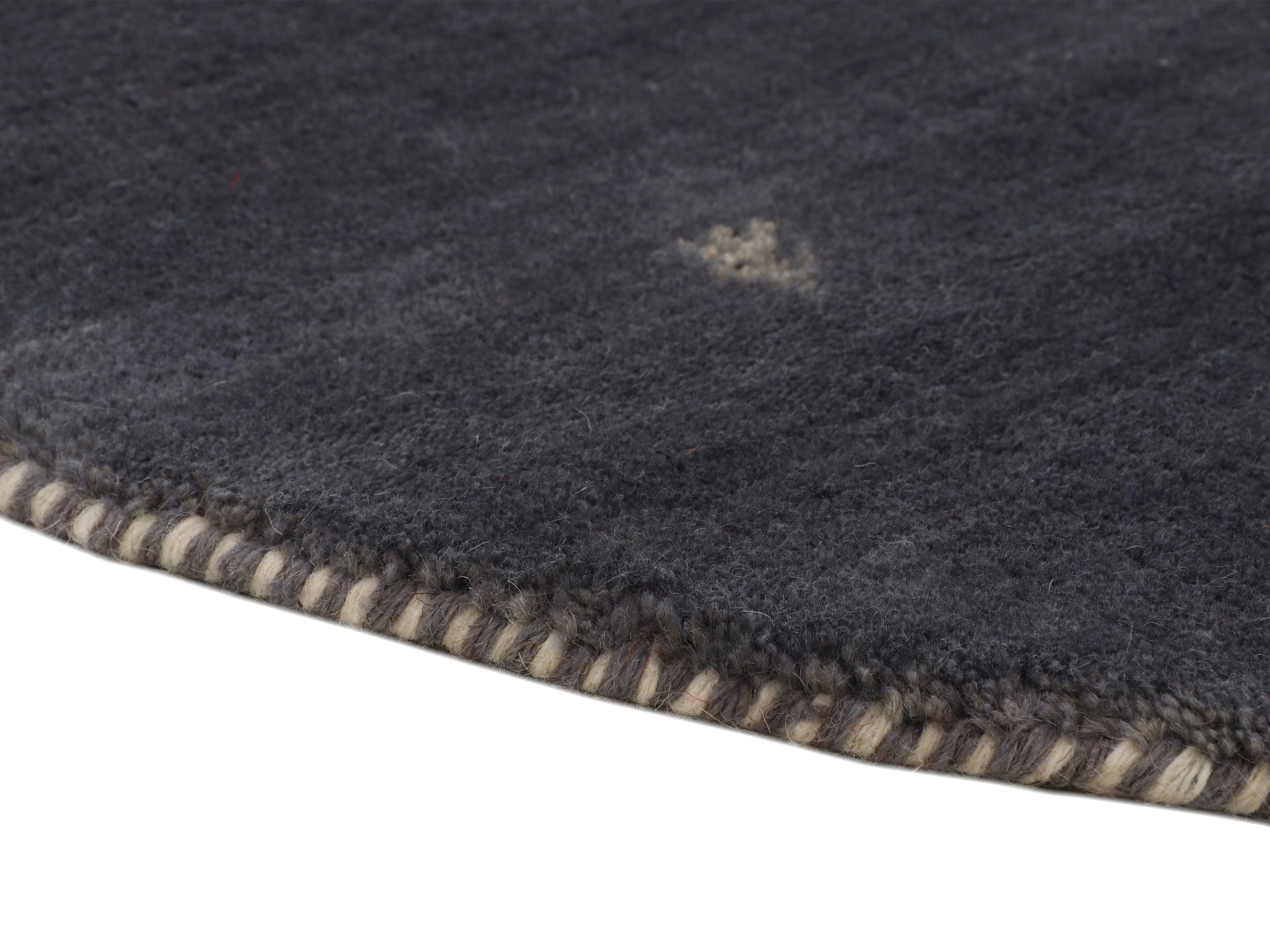 Wollteppich Gabbeh Uni Rund Grau in grau aus wolle