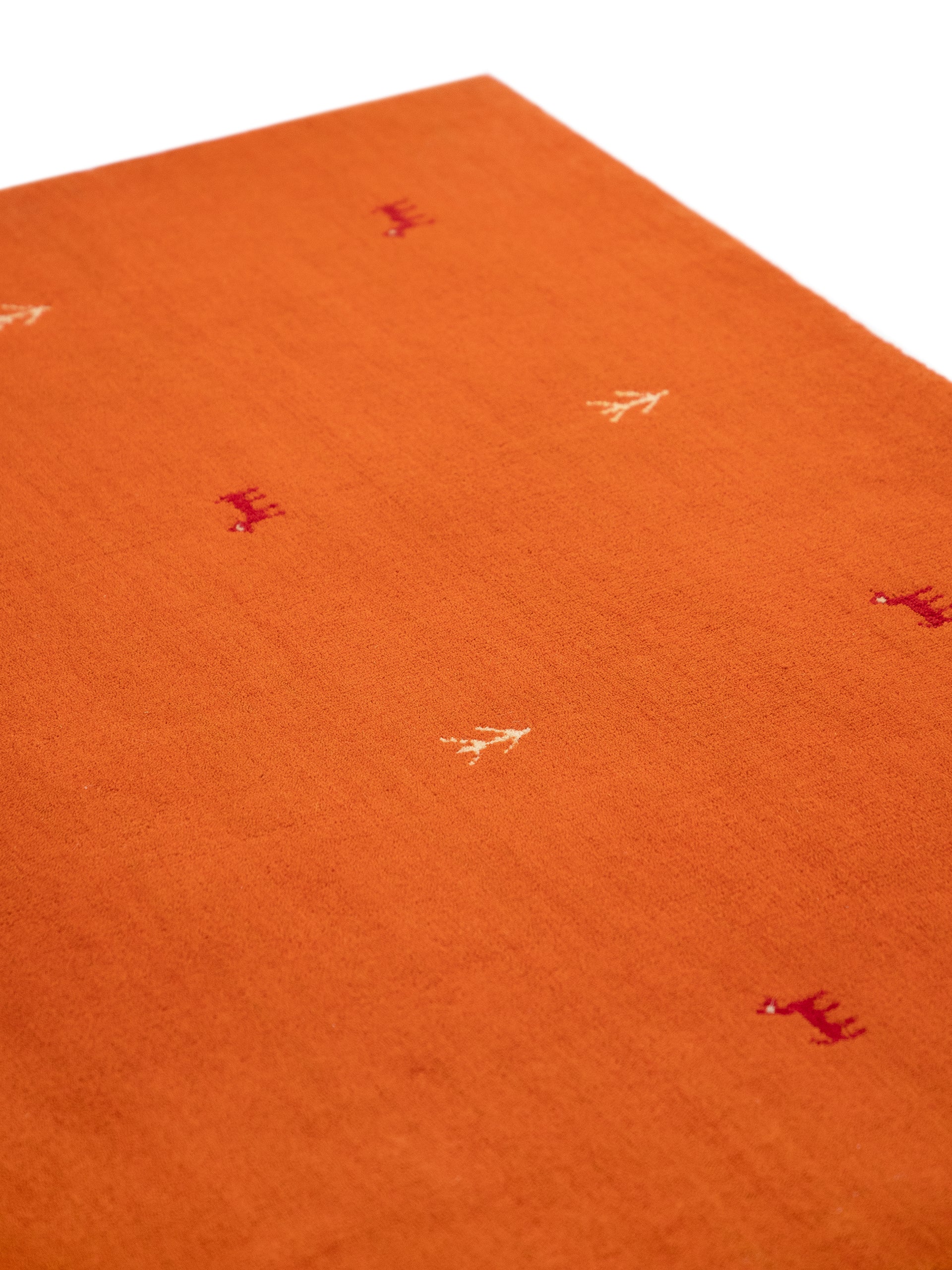 Wollteppich Gabbeh Uni Orange aus Wolle